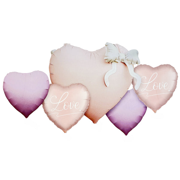 Heart shaped 5 in 1 foil balloon decoration set for romantic celebrations from Funzoop The Party Shop
Romantic heart foil balloon arrangement for anniversary and proposal decoration from Funzoop The Party Shop
