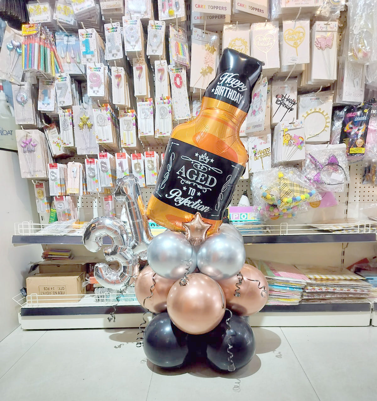Aged to Perfection Milestone Balloon Centerpiece in Gurgaon