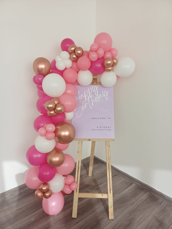 Birthday Welcome Board Balloon Garland Decoration, as an entrance greeting display with the welcome message facing arriving celebration guests.