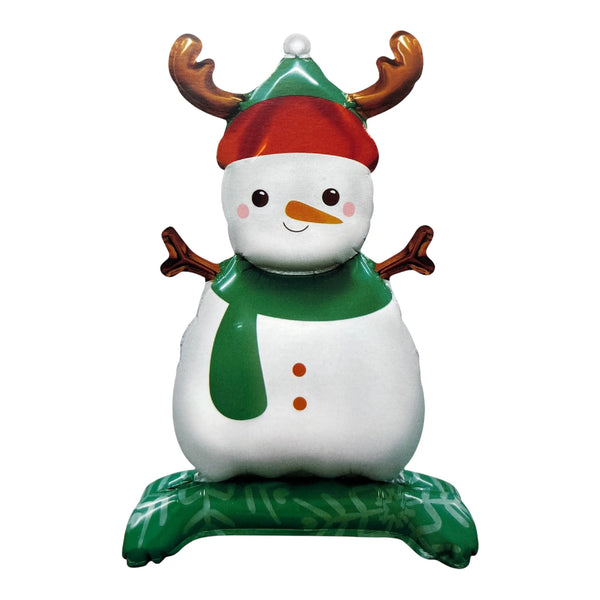 White snowman balloon wearing a green scarf and red hat, with brown antlers, twig arms and a green patterned base.