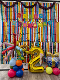 Fiesta Spark colourful birthday decoration with foil curtain backdrop, number 2 balloon, firework and cake balloon stands done by Funzoop Party Store