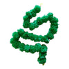 Green floral pom-pom garland with clustered decorative flowers and end loops for Diwali doorways, walls and festive celebration backdrops.