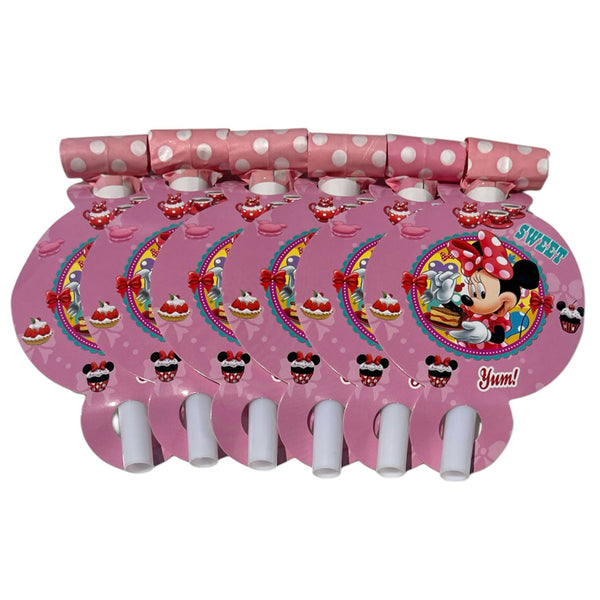 Minnie Mouse paper party blowouts for individual guest settings and matching favour bags at a bow-inspired birthday celebration.