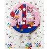 Pink round number 1 first birthday cake candle in packaging