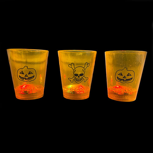 Skull-design shot glass, presenting the themed drinkware shape for a Halloween, pirate or horror-inspired party display and serving table.