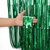Metallic Foil Fringe Party Curtain Backdrop, 7 Colours, Green for creating a reflective background behind a cake table or party photo area.