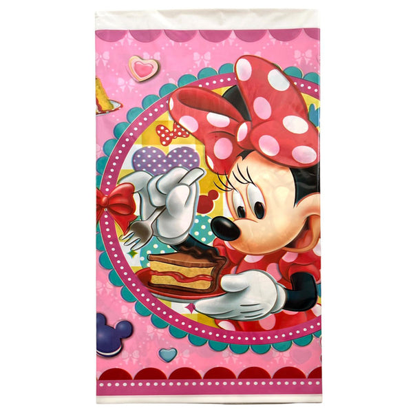 Packaged Minnie Mouse plastic table cover showing her red spotted bow, birthday cake and pink decorative border for themed parties.