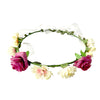 Mixed-flower floral tiara with colourful fabric blossoms and a plastic base, providing a headpiece for garden gatherings and celebration portraits.