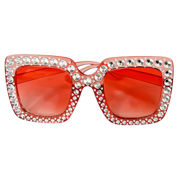 Oversized square plastic party goggles with a glossy novelty frame, providing a bold geometric accessory for retro portraits and group photographs.