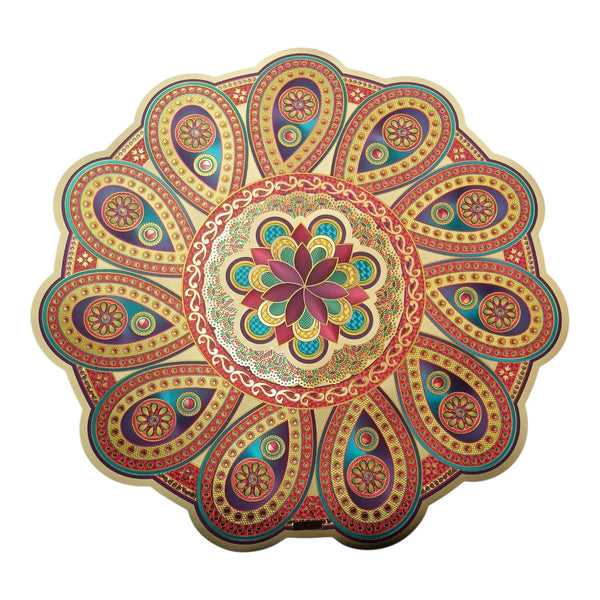 Floral Diwali rangoli decoration with a central flower, repeating paisley motifs and ornate gold, red and teal detailing.