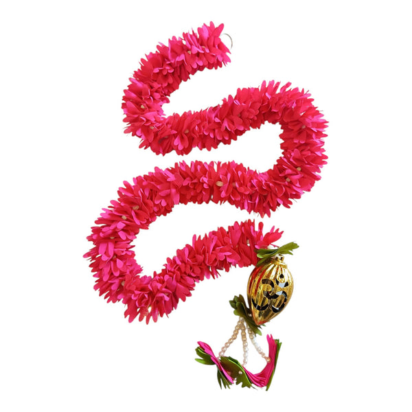 Pink floral Diwali door hanging with a gold Om ornament, white bead strands, green leaf accents and dangling flower details.