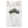 Black and silver star-shaped wax cake candles
