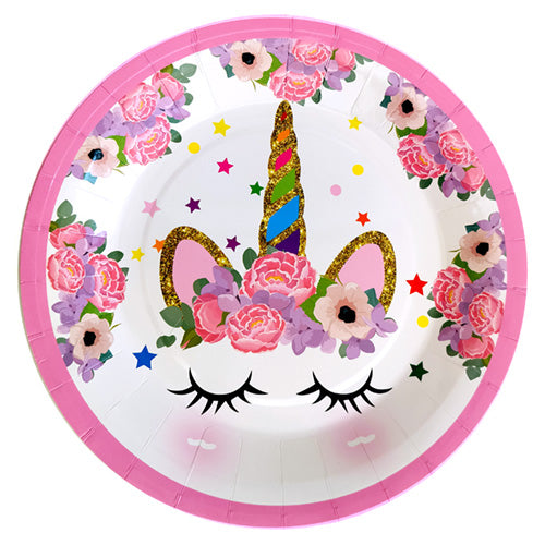 Pink unicorn paper food plate featuring closed eyes, a colourful horn and floral details around the edge for a themed celebration.