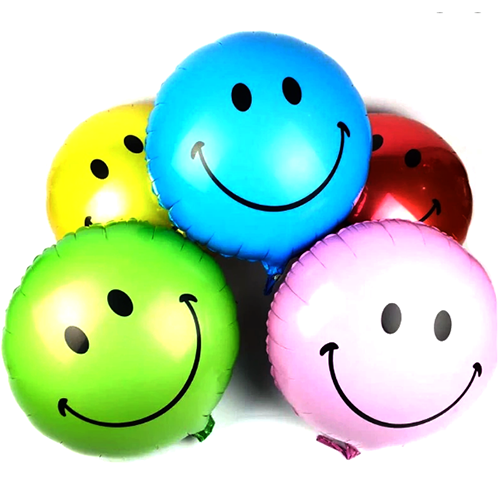 Yellow round smiley face foil balloon with black eyes and a curved smile shown as a product reference for themed parties and celebration displays, with its themed design visible.