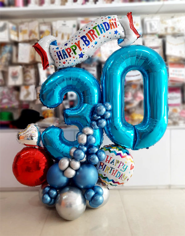 Blue birthday balloon centerpiece with number balloons and Happy Birthday banner by Funzoop, Gurgaon