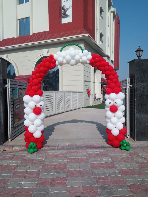 Christmas Balloon Arch Decoration, in an event decoration layout for a themed celebration and party photographs.