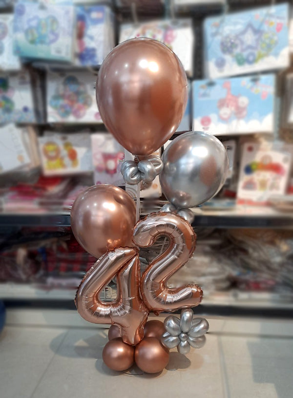 Rose gold milestone number 42 balloon stand by Funzoop, Gurgaon