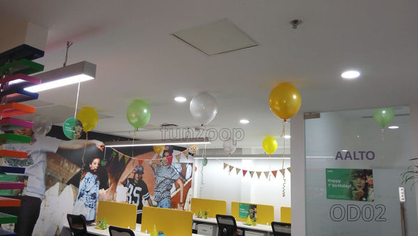First Anniversary Decor for a leading MNC, in an event decoration layout for a themed celebration and party photographs.