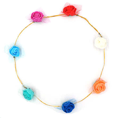 Floral tiara with flower and pearl-style detailing, providing a decorative headpiece for garden gatherings, birthday hairstyles and themed celebration portraits.