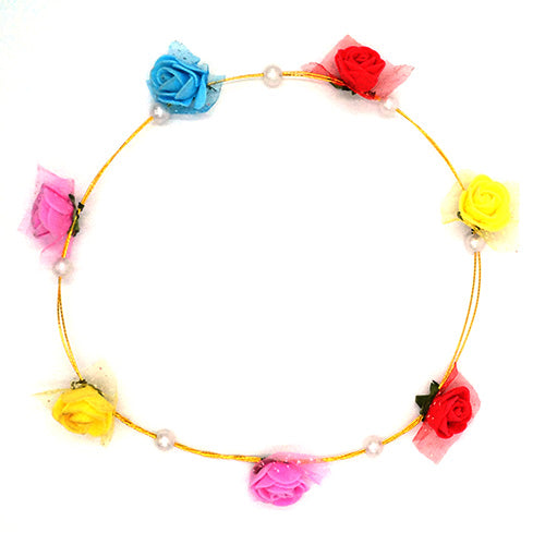 Floral tiara with flower and pearl-style detailing, providing a decorative headpiece for garden gatherings, birthday hairstyles and themed celebration portraits.