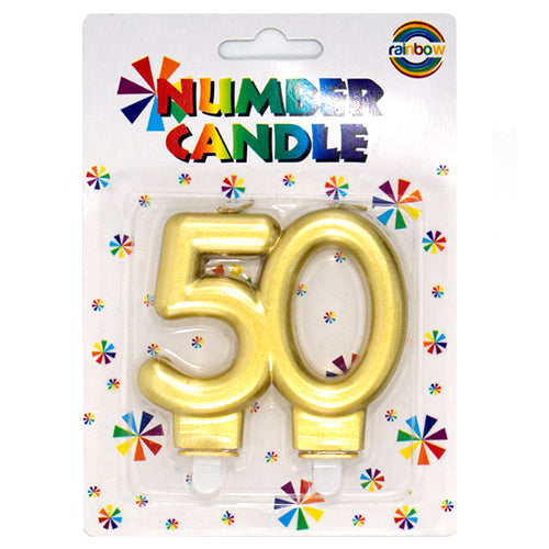Gold number 50 birthday cake candle in packaging