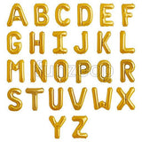 Golden foil alphabet and number balloon display for party celebrations from Funzoop The Party Shop