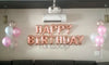 Happy Birthday Foil Balloons Banner Rose Gold In Use - Funzoop