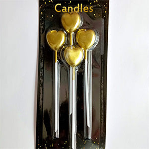 Heart shaped cake candles in assorted colours