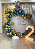 Jungle theme balloon arch decoration with illuminated LED milestone number from Funzoop The Party Shop