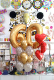 Helium-inflated 60 number balloon bouquet with red foil hearts and assorted latex balloons
