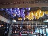 Purple and golden metallic helium balloons styled for a celebration, done by Funzoop Party Store