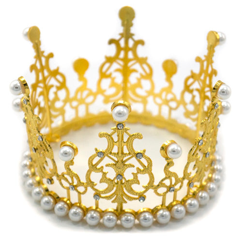Gold full-circle plastic queen crown with decorative pearl embellishments, providing a metallic-finish headpiece for royal-themed portraits and bridal photographs.